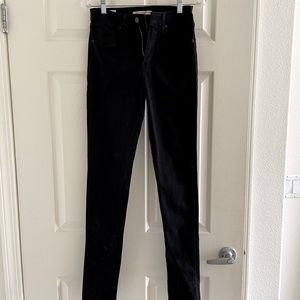Levi black high rise skinny jeans 27